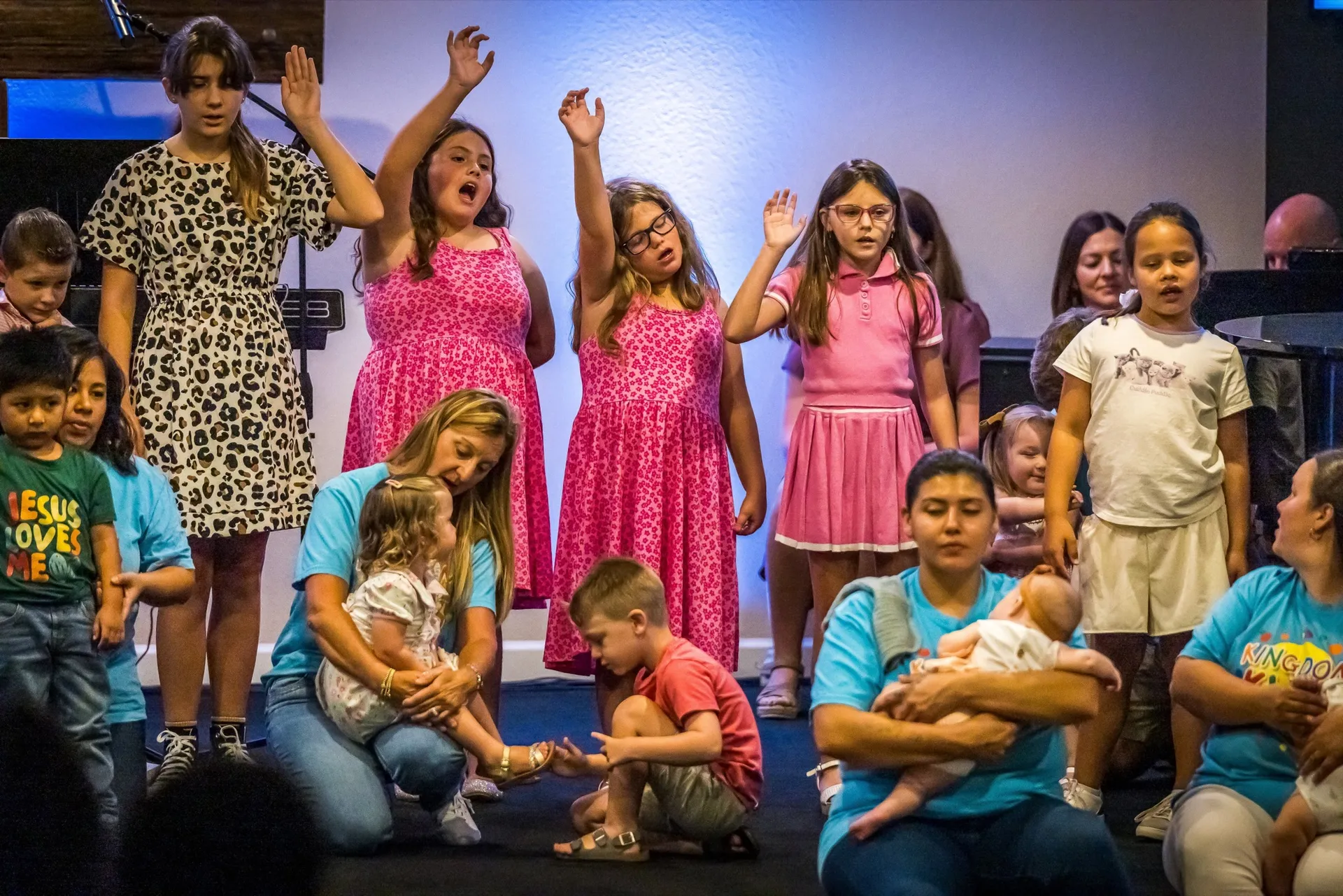 Children participating in worship with the church family