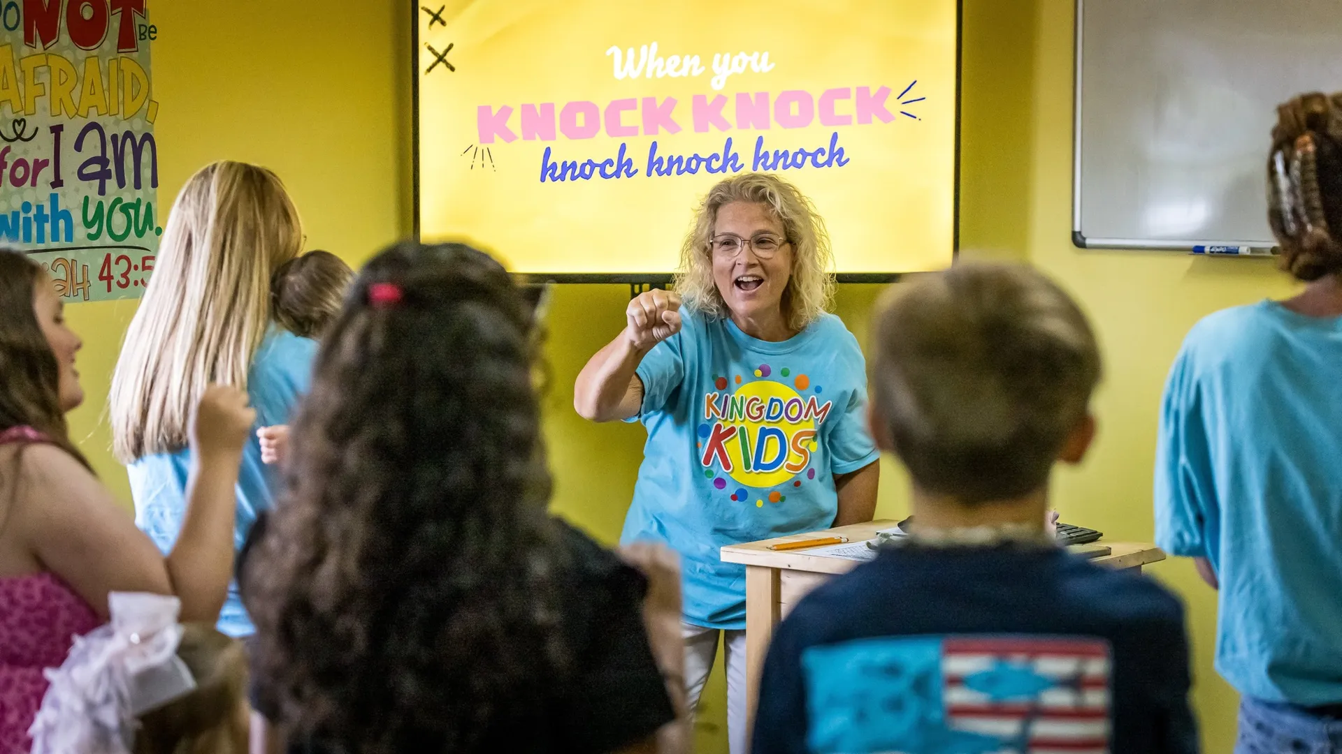 A Crossing Kids leader teaching a Bible lesson