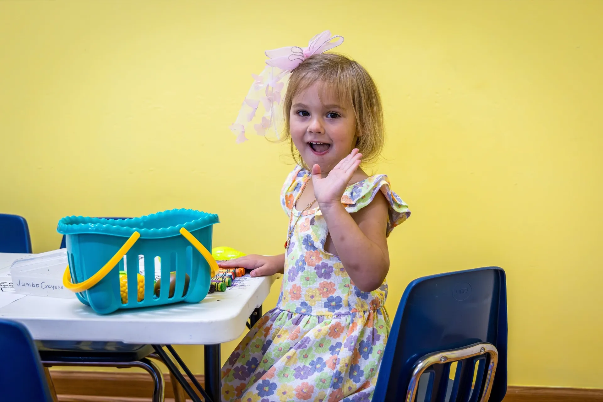 A child enjoying time in a Crossing Kids classroom