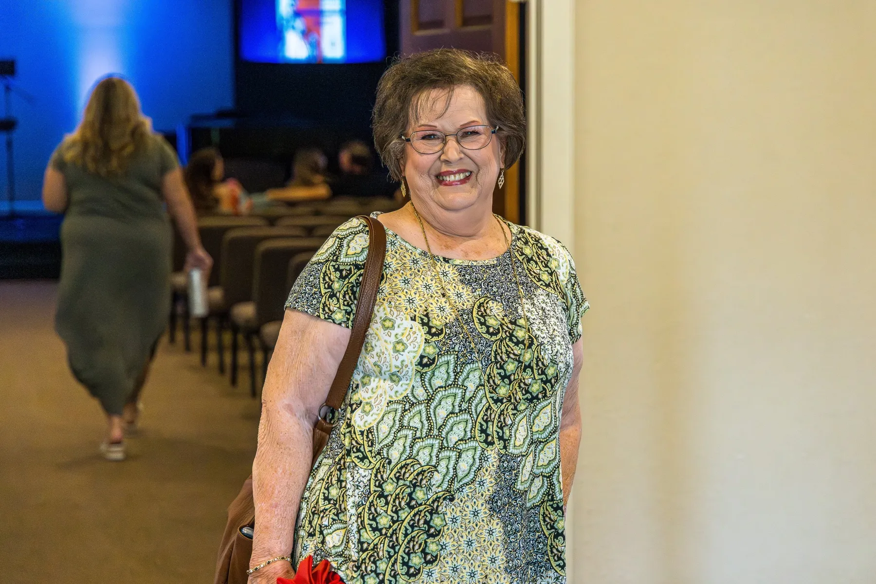 A smiling member of the Cedar Crossing church family