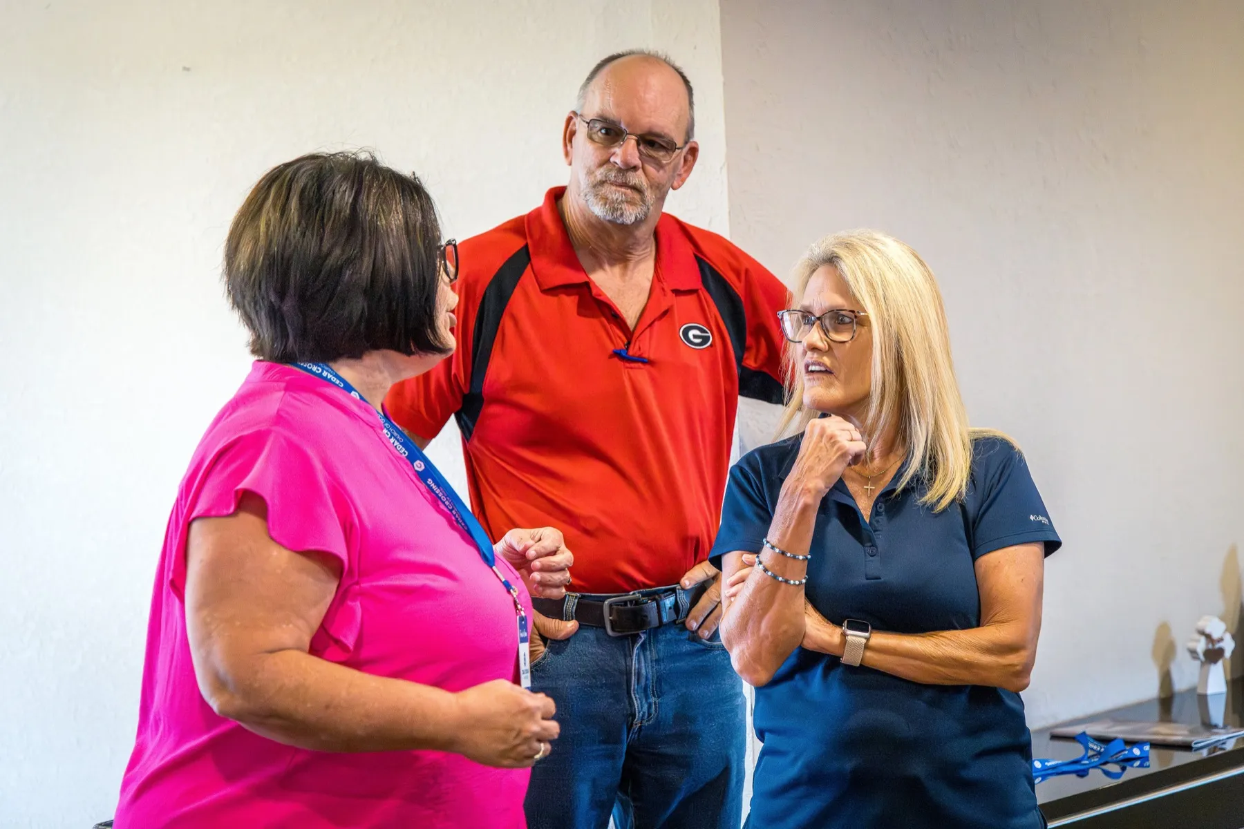 Friends talking together before service at Cedar Crossing