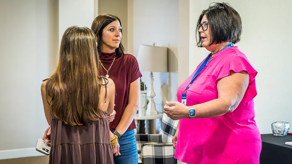 Friends connecting at Cedar Crossing before service
